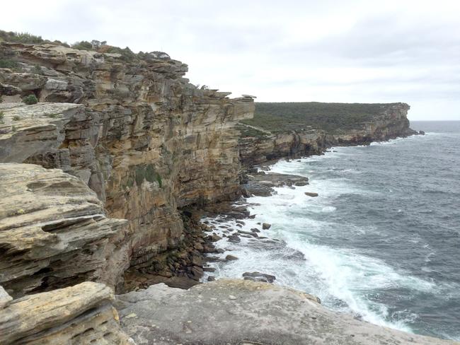 The Old Man's Hat (centre) and the cliffs on the southern side of North Head. Picture Manly Daily