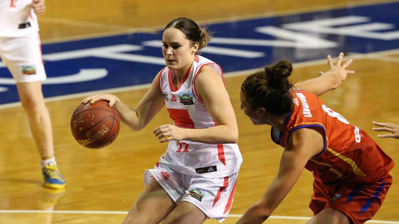 Kelly Wilson drives to the basket playing for Bendigo Spirit in a clash with Adelaide in 2014.