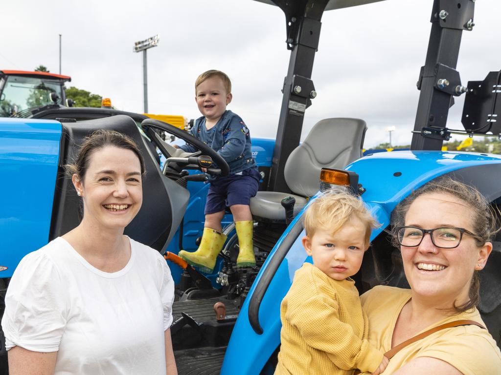 Checking out the tractors are (from left) Felicity Hannant, Vinnie Hannant, Sonny Leek and Hilary Fisher at the 2022 Toowoomba Royal Show, Friday, March 25, 2022. Picture: Kevin Farmer