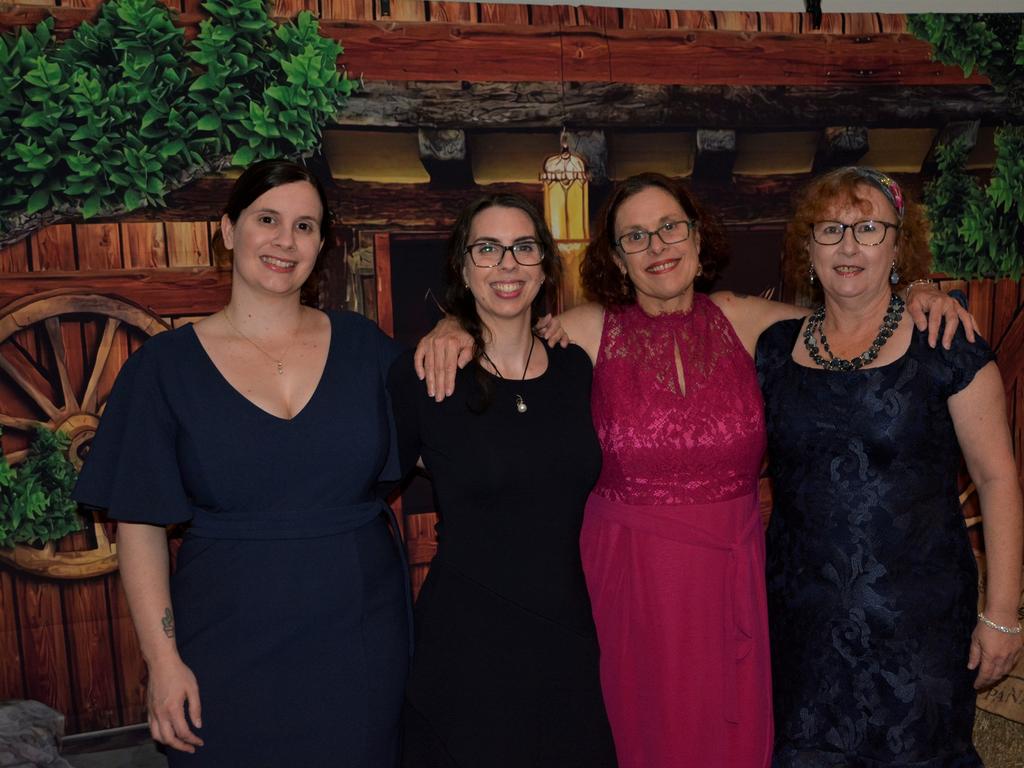 Jessica (L), Sarah, Elaine and Debbie (R) dazzle at Warwick's Coppers Ball charity event on Saturday night.