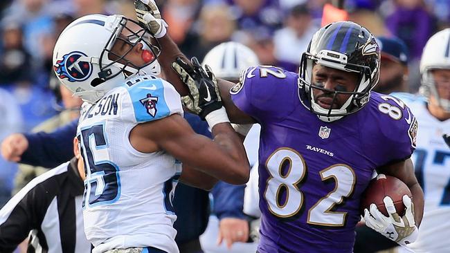 Wide receiver Torrey Smith gives the ‘don’t-argue’ palm.