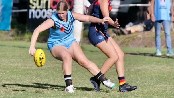 Wynnum's Ella Cook has eyes for the ball.