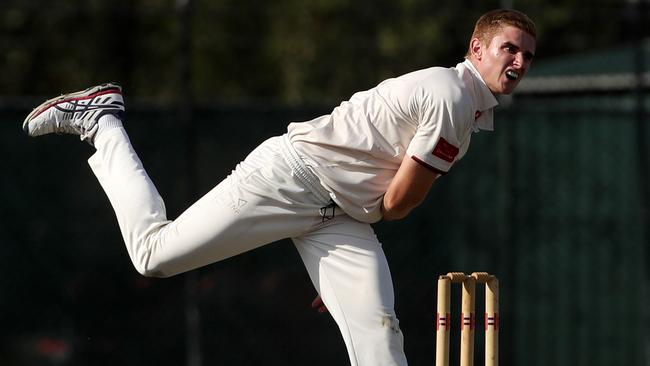 James Seymour rolls the arm over for Essendon.