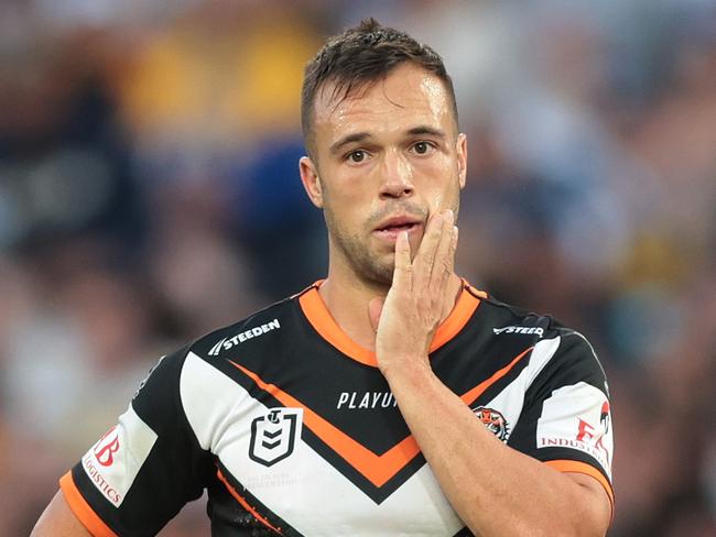 SYDNEY, AUSTRALIA - APRIL 10:  Luke Brooks of the Wests Tigers looks dejected during the round six NRL match between Wests Tigers and Parramatta Eels at Accor Stadium on April 10, 2023 in Sydney, Australia. (Photo by Mark Metcalfe/Getty Images)