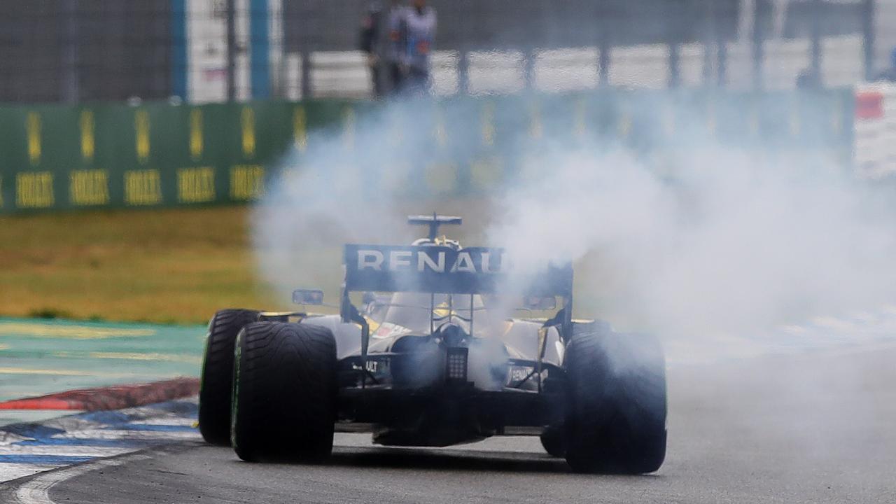 Smoke pours from the car of Daniel Ricciardo during the German Grand Prix.