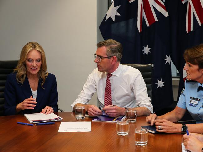 Minister for Women's Safety and the Prevention of Domestic and Sexual Violence Natalie Ward, NSW Premier Dominic Perrottet and NSW Police Force Commissioner Karen Webb met at the Parliament Offices in Sydney to discuss the new law " The Right To Ask". Picture: Gaye Gerard