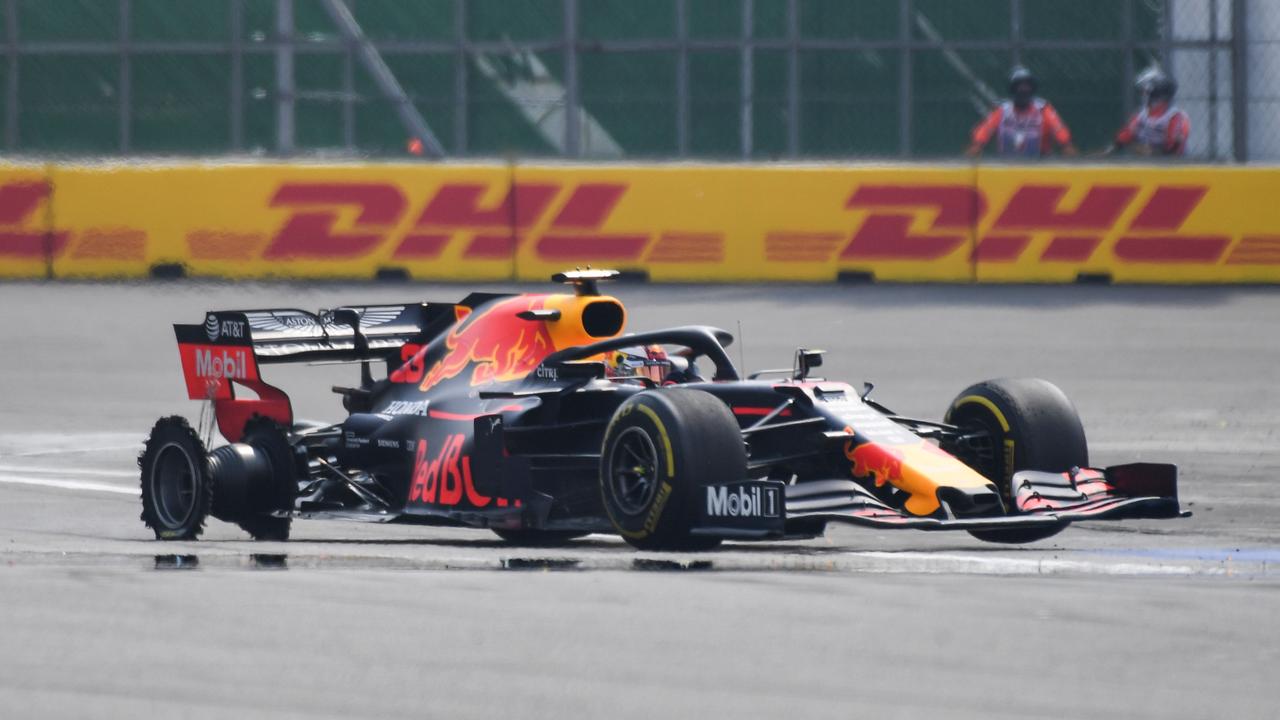 Max Verstappen limps back to the pits with a puncture. Picture: Pedro Pardo