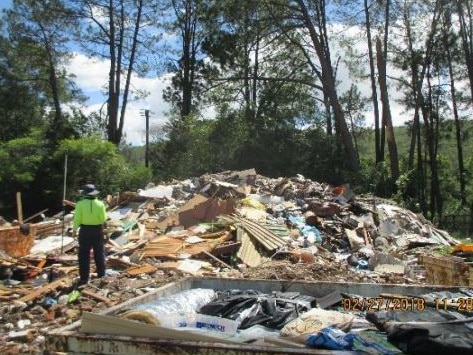 Rubbish stockpiled at 1060 Yarramalong Rd, Wyong Creek