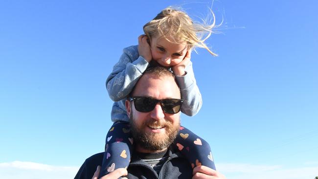 LR: Dad Dave with daughter Lola outside Finke Desert Race HQ on Friday night. Picture: (A)manda Parkinson