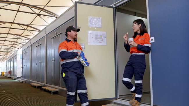 Joel Astle 26, a Dogman and Mia Liu 25, a civil engineer, are two employees with Transgrid’s EnergyConnect project who are living at the Buronga camp site near Mildura. Picture: Toby Zerna