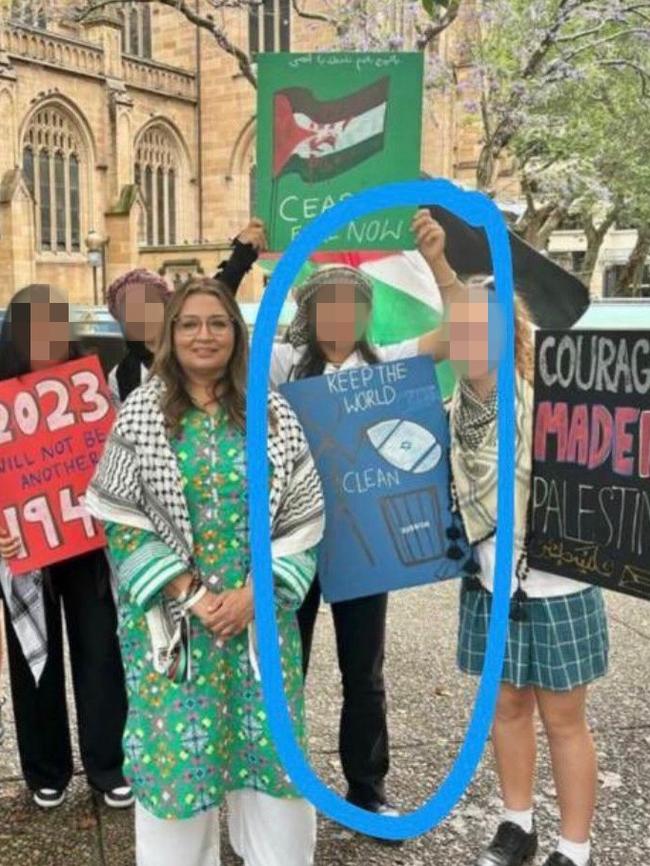 Greens senator Mehreen Faruqi and the ‘Keep the world clean’ sign in Sydney.