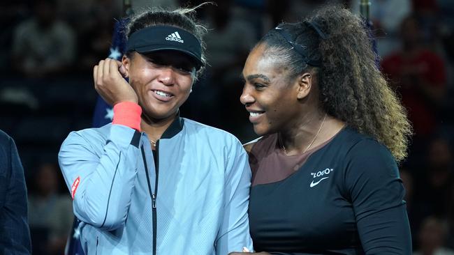 Serena Williams congratulates an emotional Naomi Osaka on her win.