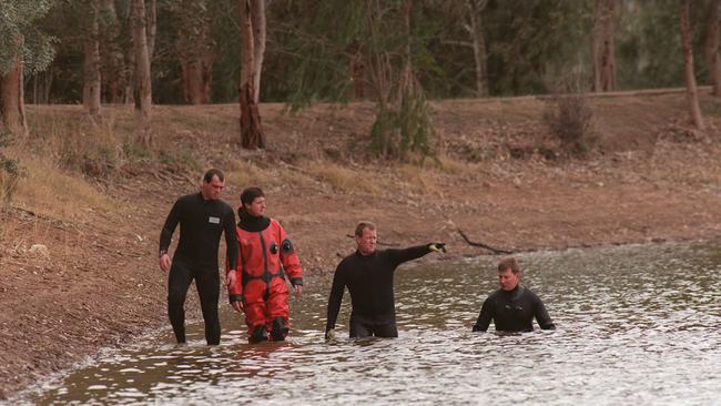 Police searching a lake at Clare for Annabel Strzelecki. 