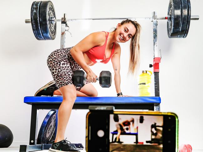 Bikini Competitor Marlette Le Feuvre inside her home gym. Picture: Nigel Hallett