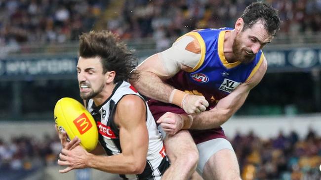 Darcy Gardiner was reported after arriving late in a marking contest with Nick Daicos. Picture: AFL Photos via Getty Images