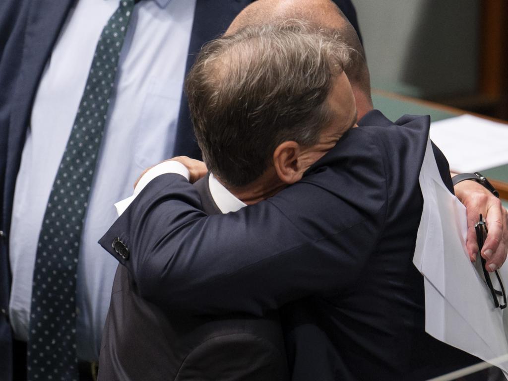 Health Minister Greg Hunt and Treasurer Josh Frydenberg embrace. Picture : NCA NewsWire / Martin Ollman
