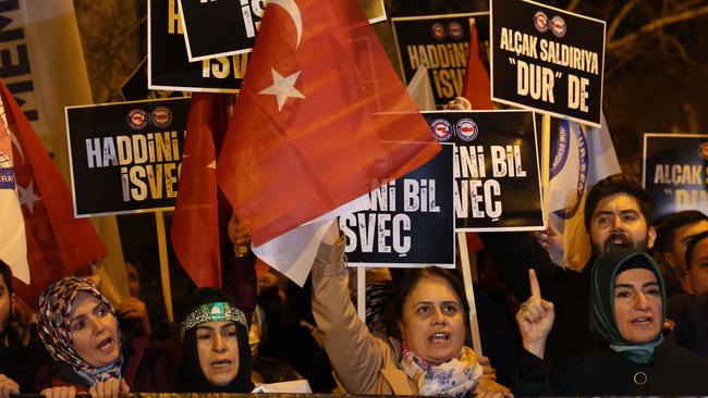 Protesters chant slogans during a demonstration outside the Sweden's embassy in Ankara on as Turkey denounced the permission granted to Rasmus Paludan to stage a protest in front of its embassy.