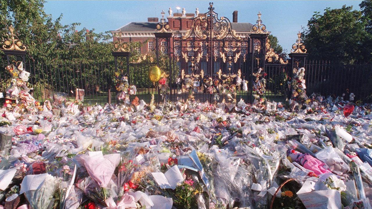 Flowers cover the entrance to Kensington Palace in this September 2, 1997 photo as the world reeled from Diana’s death. Picture: Martin Hayhow/AFP