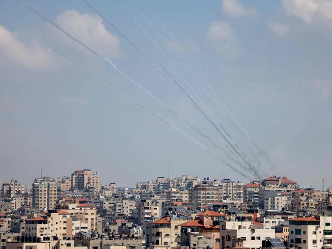 A salvo of rockets is fired by Hamas militants towards Israel in Gaza City. Picture: AFP