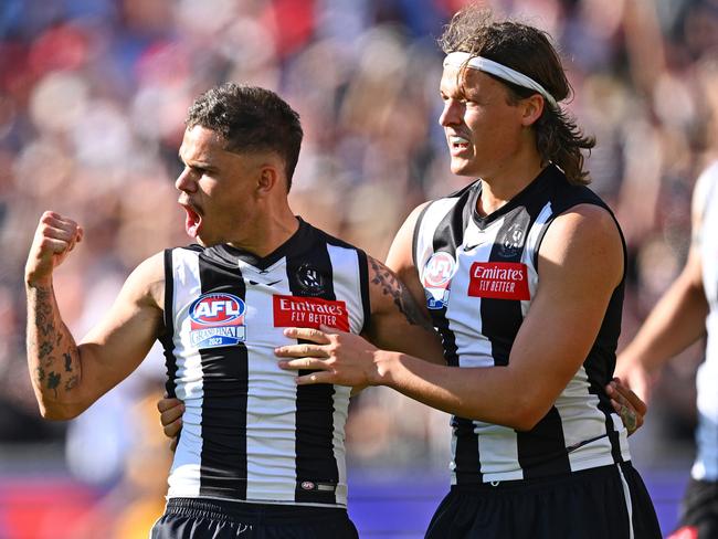 Bobby Hill is congratulated by Ginnivan after kicking one of his four goals in the 2023 grand final.Picture: Getty Images