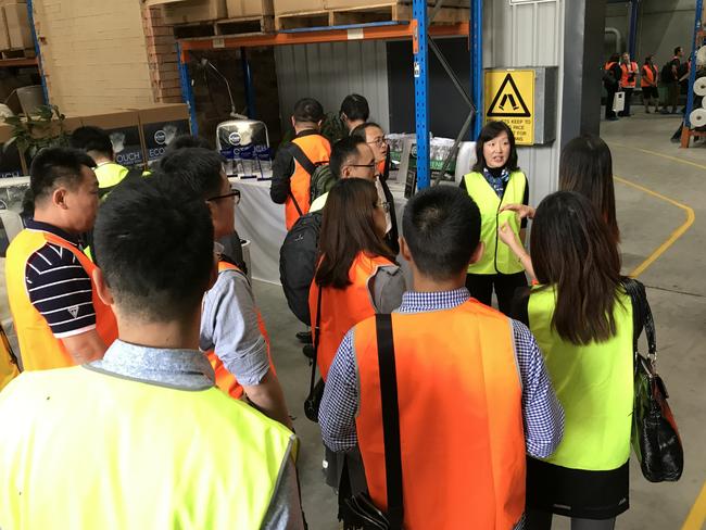 A delegation from online retail giant JD.com visit Bambi's the West Gosford Factory