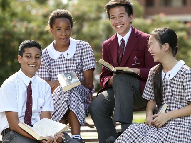 Pushkar Bhardwaj, 12, Chidinma Nwanoka, 12, Kyle Candelaria, 12, and Jasmine Fadeli, 12, at Holy Spirit Catholic College in Lakemba where significant gains have been made. Picture: Justin Lloyd