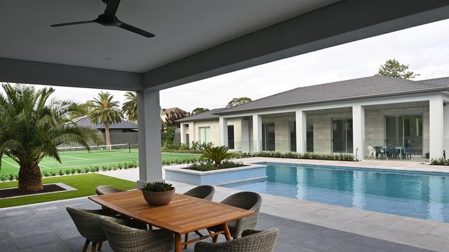 The pool house overlooking the pool, tennis court and guesthouse. Picture: Keryn Stevens