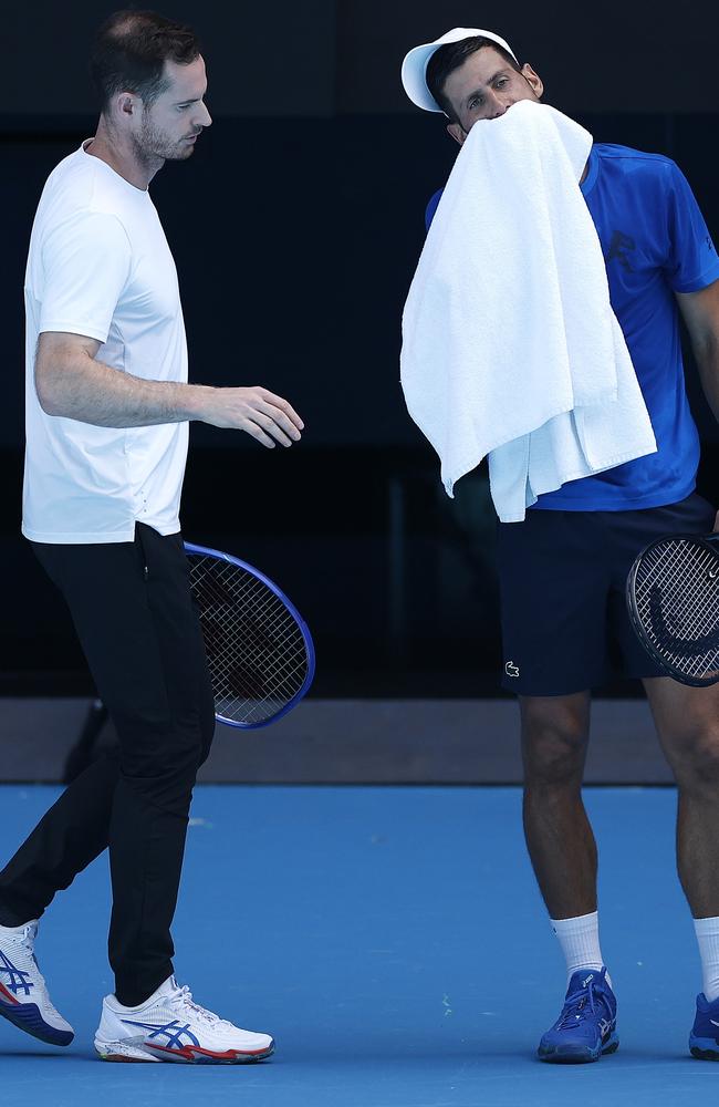 Andy Murray with Novak Djokovic at a practice session on Thursday. Picture: Getty