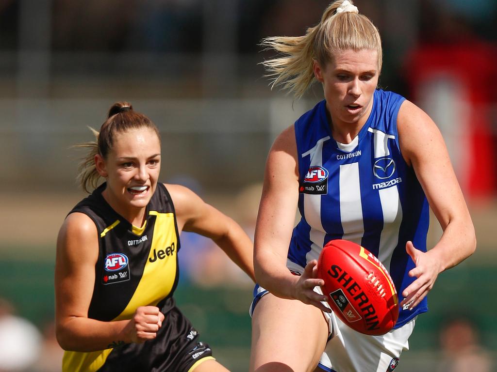 Abbey Green runs away from star Tiger Monique Conti. Picture: Getty Images