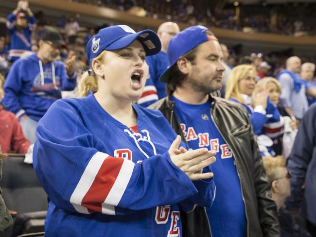 Rebel Wilson attends a New York Rangers Game with Mickey Gooch Jr. in New York City.