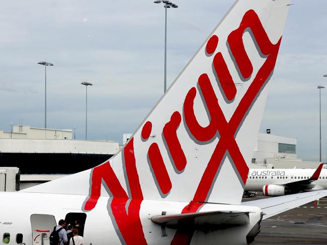 SYDNEY, AUSTRALIA - NewsWire Photos - SEPTEMBER 09, 2022: General generic editorial stock image of Virgin airplane at Sydney Domestic Airport. Picture: NCA NewsWire / Nicholas Eagar