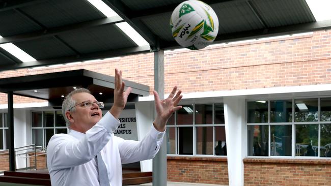 Mr Morrison practises his netball skills. Picture: Damian Shaw