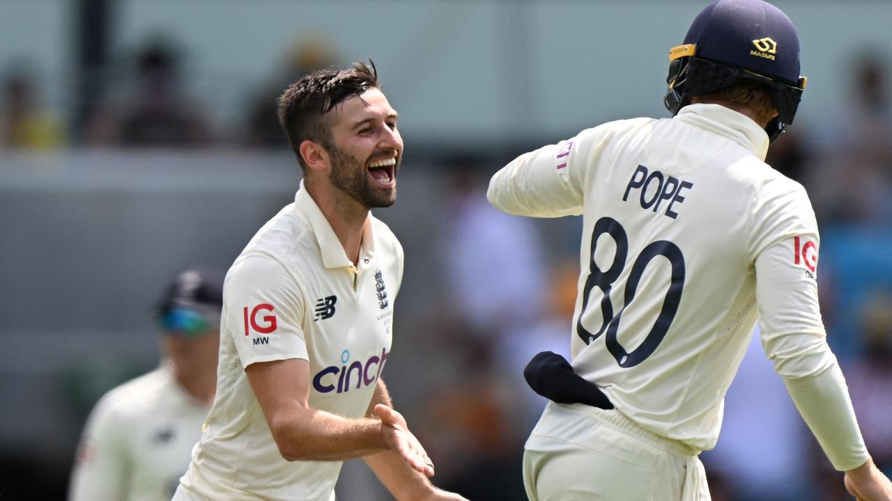 Mark Wood celebrates his wicket of Pat Cummins of Australia. (Photo by Steve Bell/Getty Images)