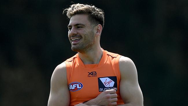 You would be all smiles if you have Stephen Coniglio in your SuperCoach team. Picture: AAP Image/Dan Himbrechts.