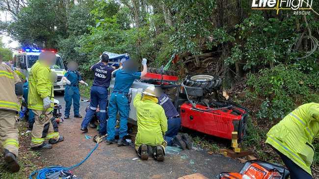 A man was pinned underneath his rolled tractor for more than an hour today and was flown to hospital by the RACQ's LifeFlight Rescue. Photo: LifeFlight media. 