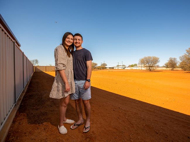 Tom Hennessy and Tessa McDougall at the block of land they have purchased in Quilpie as part of the council’s homeowner grant scheme. Picture: Leon O'Neil