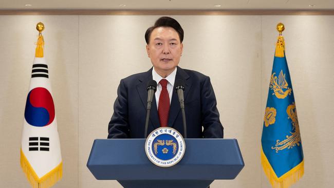 A defiant South Korean President Yoon Suk Yeol vowed to fight “until the very last minute” during an address at the Presidential Office in Seoul on December 12. Picture courtesy of the South Korean Presidential Office via Yonhap / AFP