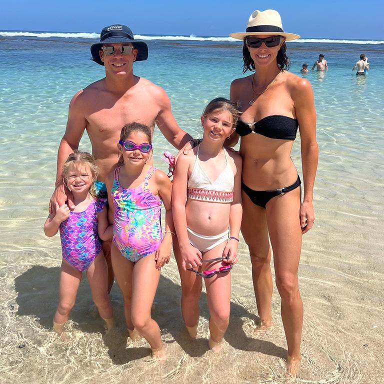 The professional ironwoman and mother-of-three has partnered with Surf Life Saving Australia to help spread water safety awareness. Picture: Instagram/CandiceWarner