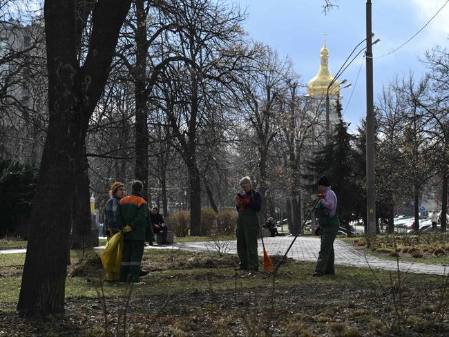 Council workers in a park in central Kyiv this week. Picture: AFP