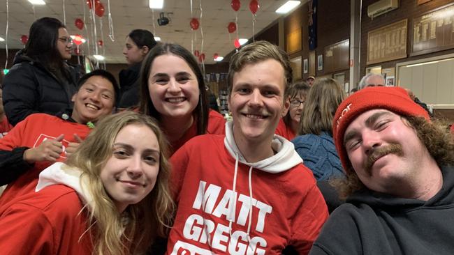 Deakin ALP supporters Jonathan De La Pena, Laura Moorfoot, Bethany Shegog, Sheldon Gait, and Adam Steiner celebrate election night at Heatherdale Bowls Club. Picture: Kirra Grimes