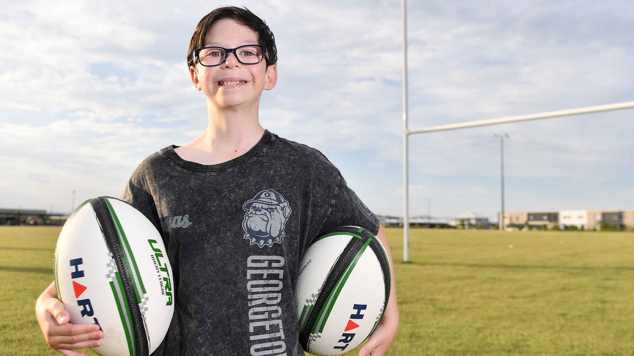 Lucas Bennett is the official ball boy for the exhibition match. Picture: Patrick Woods