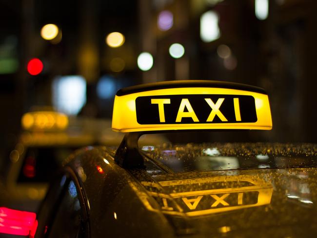 Generic taxi at night.