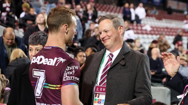 Daly Cherry-Evans of the Sea Eagles embraces owner and Chairman of the Manly Warringah Sea Eagles Scott Penn. Picture: Cameron Spencer/Getty Images