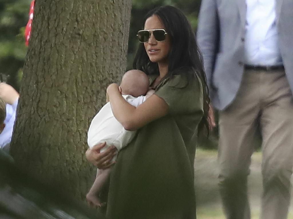 Britain's Meghan, Duchess of Sussex takes her son Archie to the polo. Picture: Andrew Matthews/PA via AP.