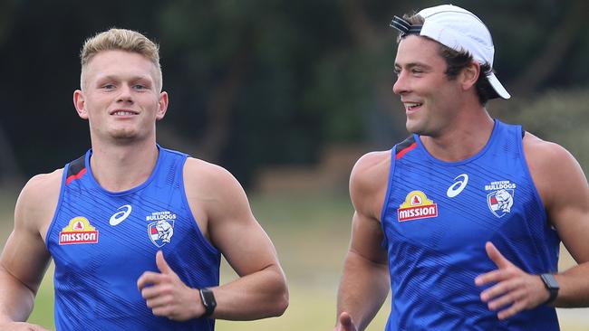 Adam Treloar and Josh Dunkley run laps at Whitten Oval on Wednesday, December 16. Picture: WESTERN BULLDOGS