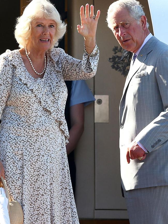 Then Prince Charles and Camilla wave farewell in Perth as they depart Australia in 2015. Picture: AFP.