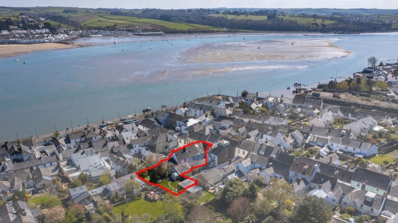 The house, three cottages and three apartments are on the market for $A2.7 million