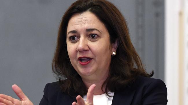 Queensland Premier Annastacia Palaszczuk gestures during question time at the Queensland Parliament in Brisbane. (AAP Image/Dave Hunt)