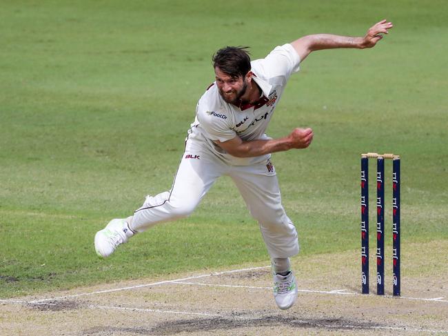 Neser bowls for Queensland. Picture: AAP Image/Glenn Hunt