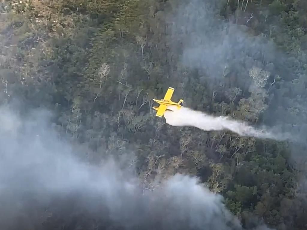 Queensland Fire and Emergency Services battle the blaze on Fraser Island. Picture: Supplied